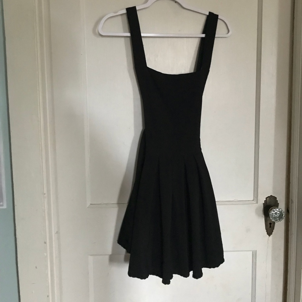 Black cross strap pinafore dress